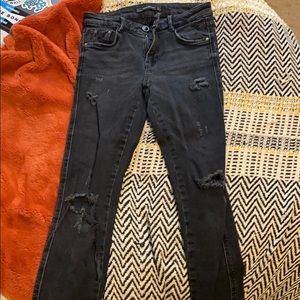 Black distressed skinny jeans